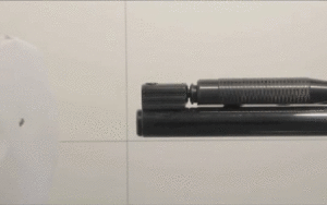 When does a pellet exit a spring air gun, Spring-action air rifle pellet timing, How spring powered air guns work, Air gun pellet exit mechanism explained, Top-rated air gun superstore USA,